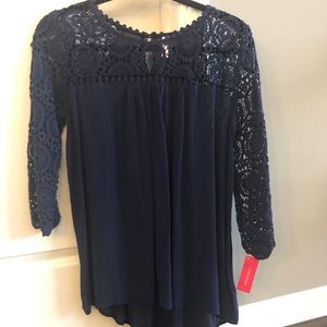 Navy blue top with lace sleeves
